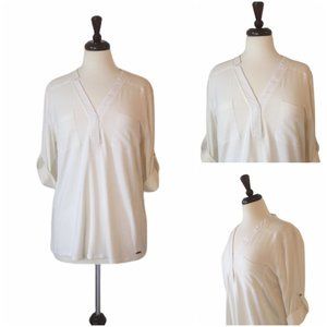 NWT CK v-neck roll sleeve top in cream, size M